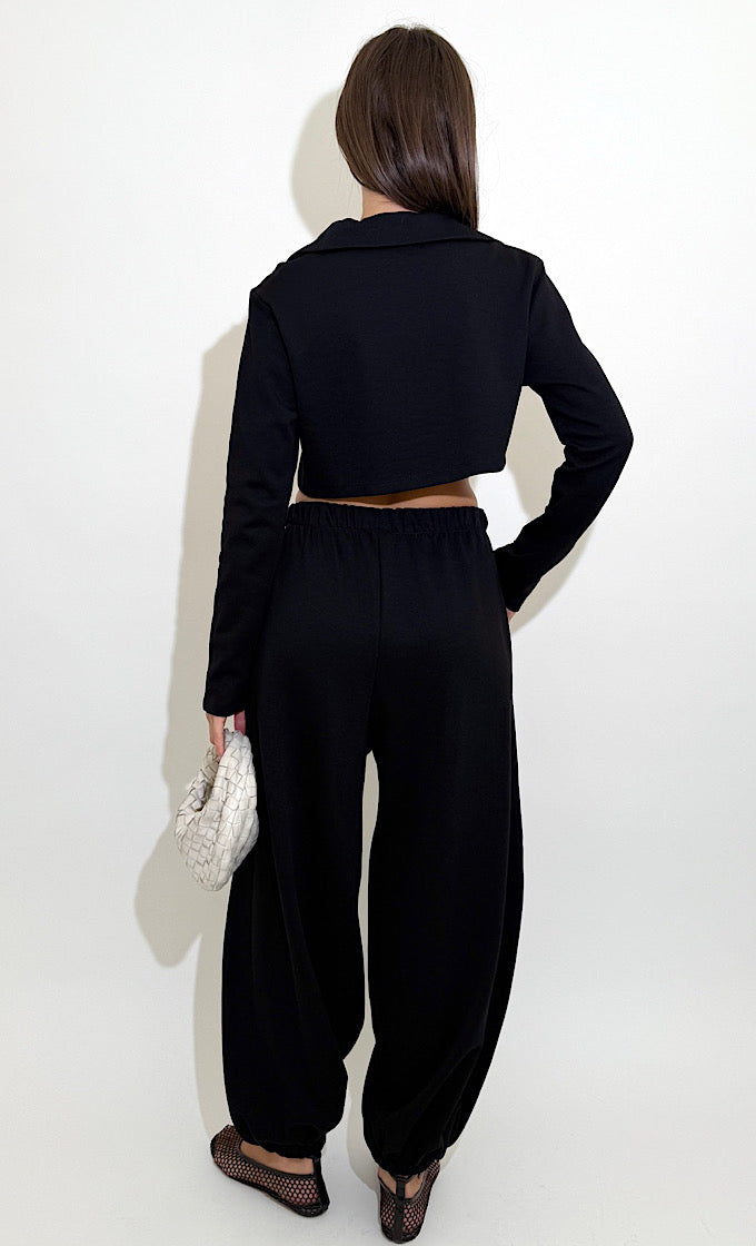 Lucas's black suit.