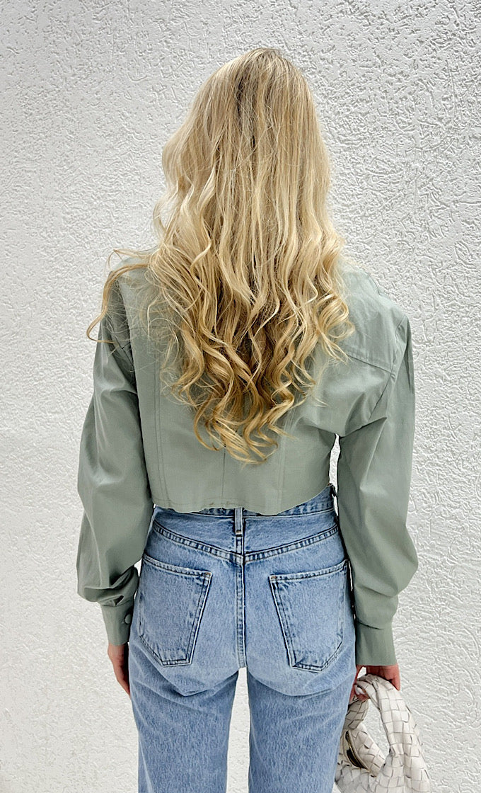 Nicole green shirt